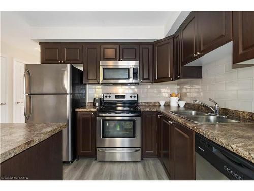92-20 Mcconkey Crescent, Brantford, ON - Indoor Photo Showing Kitchen With Double Sink