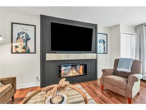 21 Burdock Boulevard, Brantford, ON - Indoor Photo Showing Living Room With Fireplace