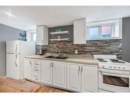 21 Burdock Boulevard, Brantford, ON - Indoor Photo Showing Kitchen With Double Sink