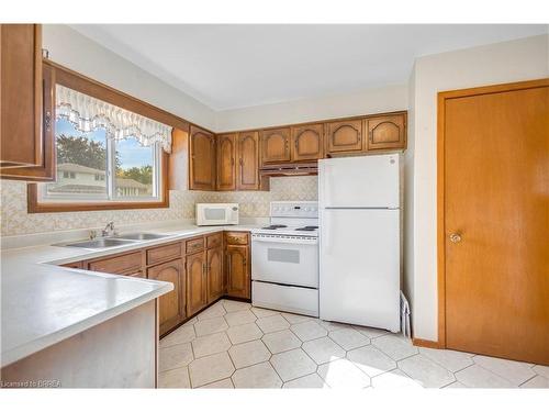 14 Burdock Boulevard, Brantford, ON - Indoor Photo Showing Kitchen With Double Sink