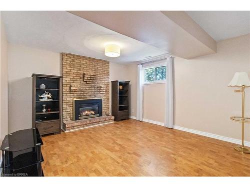 34 Sympatica Crescent, Brantford, ON - Indoor Photo Showing Living Room With Fireplace