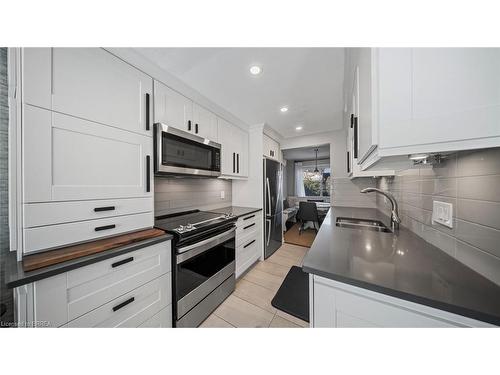 23 Freeman Crescent, Simcoe, ON - Indoor Photo Showing Kitchen With Double Sink With Upgraded Kitchen
