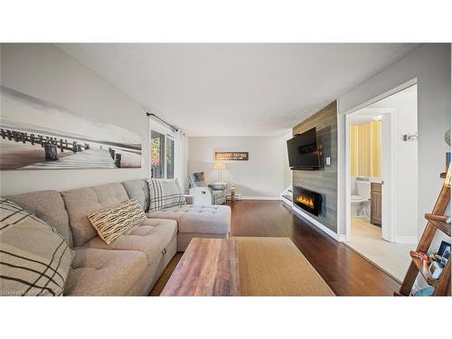 23 Freeman Crescent, Simcoe, ON - Indoor Photo Showing Living Room With Fireplace