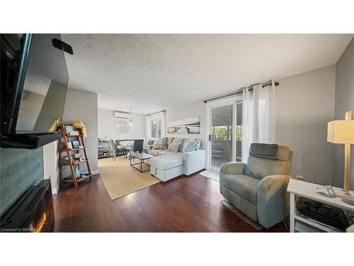 23 Freeman Crescent, Simcoe, ON - Indoor Photo Showing Living Room With Fireplace