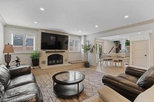 10 Stymie Boulevard, Brantford, ON - Indoor Photo Showing Living Room With Fireplace