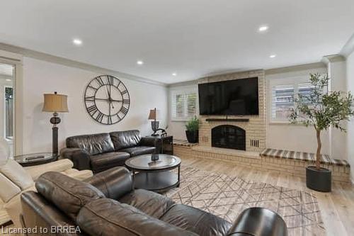 10 Stymie Boulevard, Brantford, ON - Indoor Photo Showing Living Room With Fireplace