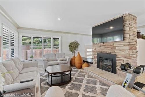 10 Stymie Boulevard, Brantford, ON - Indoor Photo Showing Living Room With Fireplace