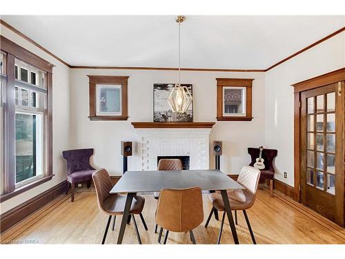 134 Sherman Avenue S, Hamilton, ON - Indoor Photo Showing Dining Room With Fireplace