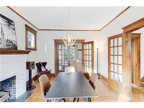 134 Sherman Avenue S, Hamilton, ON - Indoor Photo Showing Dining Room With Fireplace