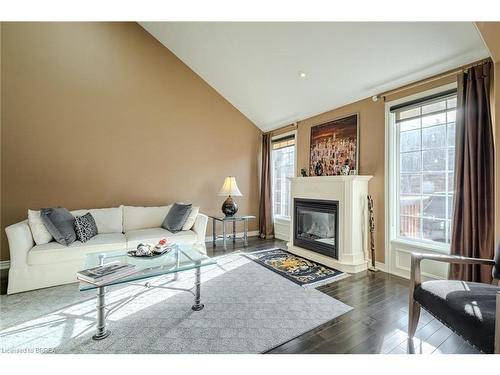 49-655 Park Road N, Brantford, ON - Indoor Photo Showing Living Room With Fireplace