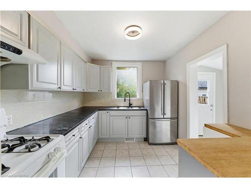 166 Beach Road, Hamilton, ON - Indoor Photo Showing Kitchen With Double Sink
