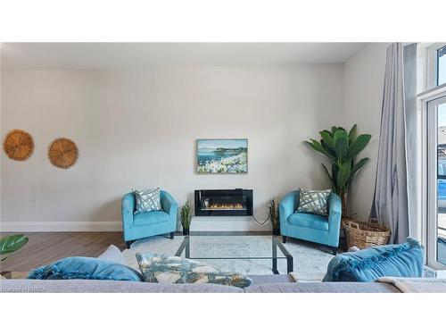 103A-85 Morrell Street, Brantford, ON - Indoor Photo Showing Living Room With Fireplace