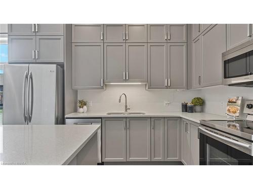 103A-85 Morrell Street, Brantford, ON - Indoor Photo Showing Kitchen With Double Sink