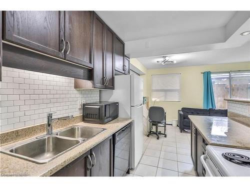 104-793 Colborne Street E, Brantford, ON - Indoor Photo Showing Kitchen With Double Sink