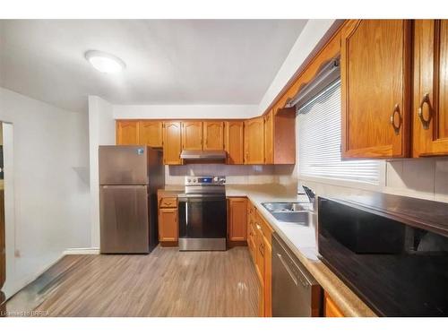 698 West 5Th Street, Hamilton, ON - Indoor Photo Showing Kitchen With Double Sink