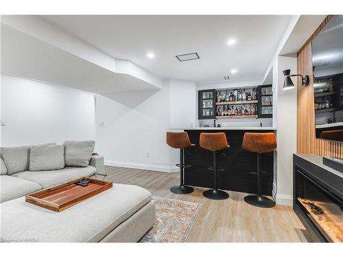 20 Cumberland Street, Brantford, ON - Indoor Photo Showing Other Room With Fireplace