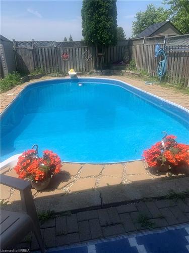 128 Mcmeeken Drive, Cambridge, ON - Outdoor With In Ground Pool With Backyard