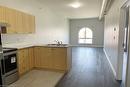 403-150 Colborne Street, Brantford, ON  - Indoor Photo Showing Kitchen With Double Sink 