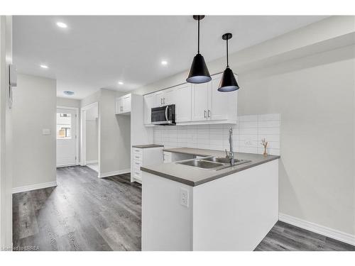 165 Grove Street, Simcoe, ON - Indoor Photo Showing Kitchen With Double Sink