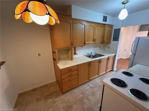 507-1964 Main Street W, Hamilton, ON - Indoor Photo Showing Kitchen With Double Sink
