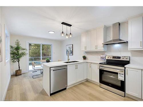 269 East 28Th Street, Hamilton, ON - Indoor Photo Showing Kitchen With Stainless Steel Kitchen With Double Sink
