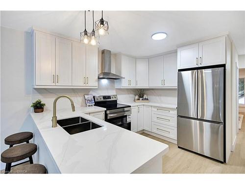 269 East 28Th Street, Hamilton, ON - Indoor Photo Showing Kitchen With Stainless Steel Kitchen With Double Sink With Upgraded Kitchen