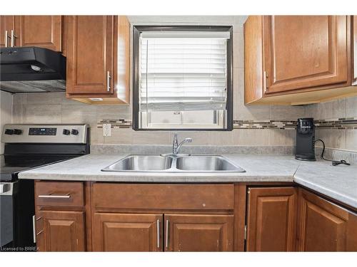 87 Barnesdale Avenue N, Hamilton, ON - Indoor Photo Showing Kitchen With Double Sink
