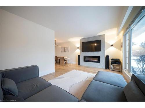 2 Grenada Drive, Simcoe, ON - Indoor Photo Showing Living Room With Fireplace