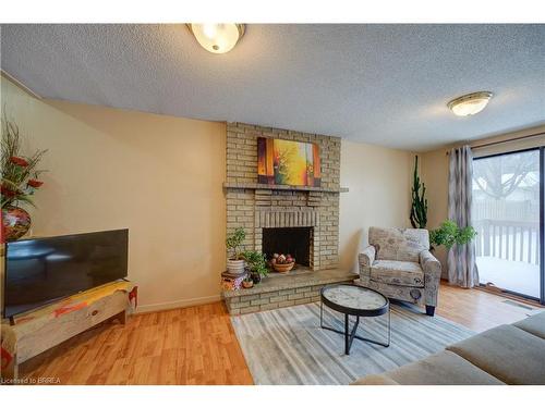 9 Max Webster Road, Brantford, ON - Indoor Photo Showing Living Room With Fireplace