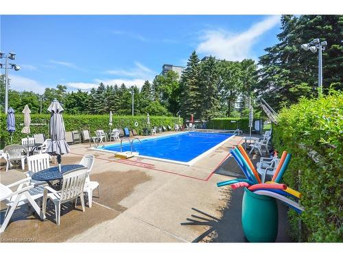 108-23 Woodlawn Rd E Road, Guelph, ON - Outdoor With In Ground Pool With Backyard