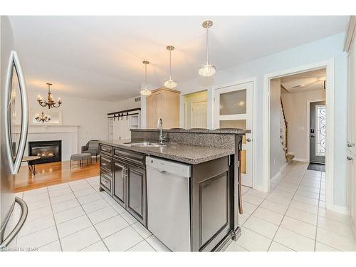 102 Downey Road, Guelph, ON - Indoor Photo Showing Kitchen With Fireplace