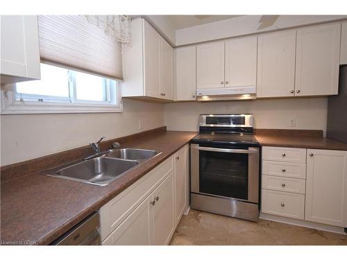 38 Mcgibbon Street, North Bay, ON - Indoor Photo Showing Kitchen With Double Sink
