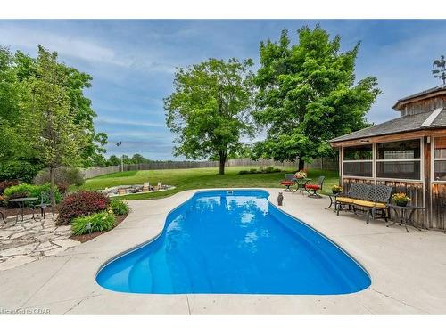 6954 Fife Road, Guelph/Eramosa, ON - Outdoor With In Ground Pool With Deck Patio Veranda With Backyard