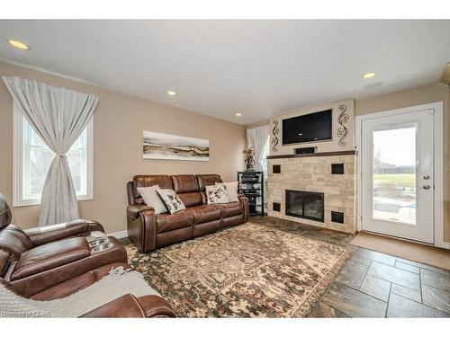 6954 Fife Road, Guelph/Eramosa, ON - Indoor Photo Showing Living Room With Fireplace