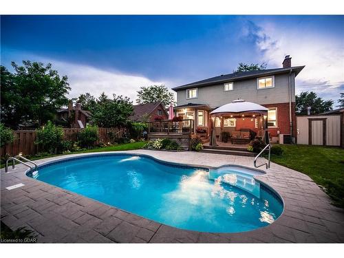 21 Kortright Road E, Guelph, ON - Outdoor With In Ground Pool With Deck Patio Veranda With Backyard