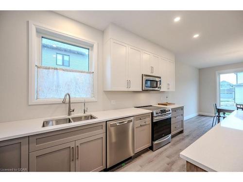 45 Queensgate Crescent, Breslau, ON - Indoor Photo Showing Kitchen With Double Sink