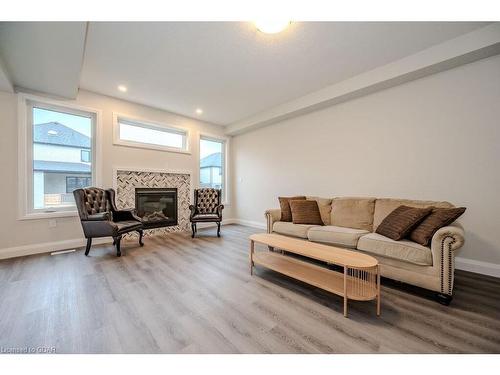 45 Queensgate Crescent, Breslau, ON - Indoor Photo Showing Living Room With Fireplace