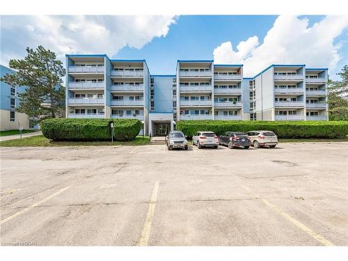 106-105 Conroy Crescent, Guelph, ON - Outdoor With Balcony With Facade