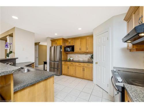 141 Riverwalk Place, Rockwood, ON - Indoor Photo Showing Kitchen With Double Sink