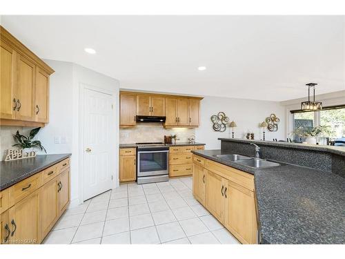 141 Riverwalk Place, Rockwood, ON - Indoor Photo Showing Kitchen With Double Sink