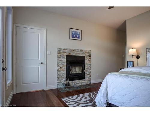 150B Beach Road Left, Massey, ON - Indoor Photo Showing Bedroom With Fireplace