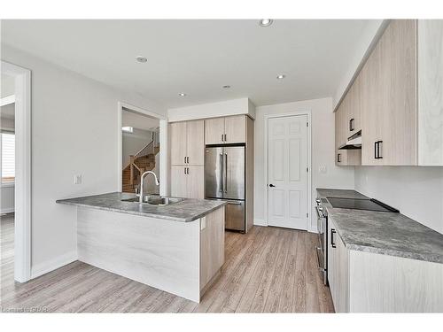 149 Harpin Way E, Fergus, ON - Indoor Photo Showing Kitchen With Double Sink