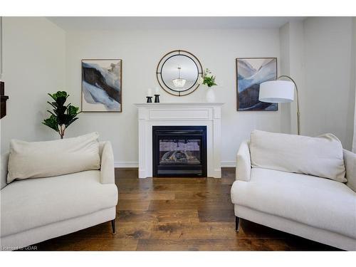 64 Harpin Way E, Fergus, ON - Indoor Photo Showing Living Room With Fireplace