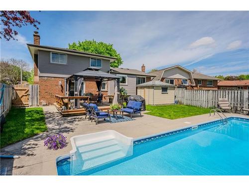 23 Meadow Crescent, Guelph, ON - Outdoor With In Ground Pool With Deck Patio Veranda