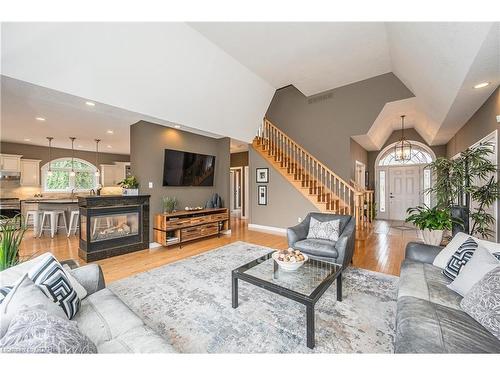 20 Walkerbrae Trail, Guelph, ON - Indoor Photo Showing Living Room With Fireplace