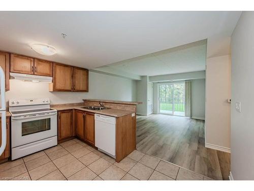 203-645 St David Street S, Fergus, ON - Indoor Photo Showing Kitchen With Double Sink