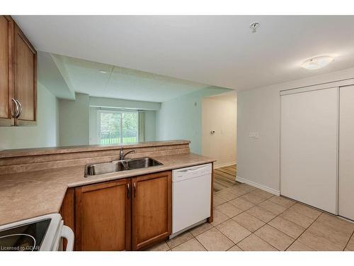 203-645 St David Street S, Fergus, ON - Indoor Photo Showing Kitchen With Double Sink