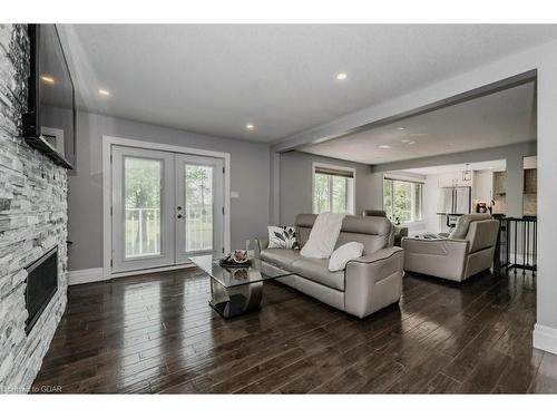 5954 Wellington Rd 7, Guelph, ON - Indoor Photo Showing Living Room With Fireplace