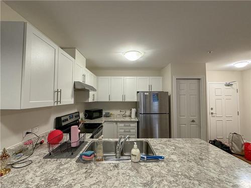 112-7 Kay Crescent, Guelph, ON - Indoor Photo Showing Kitchen With Double Sink