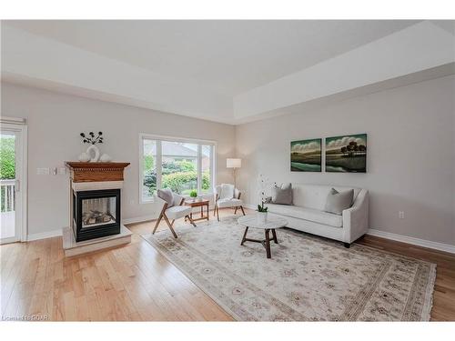 49 Cherry Blossom Circle, Guelph, ON - Indoor Photo Showing Living Room With Fireplace